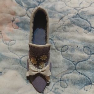 Elegant Purple Shoe Sculpture